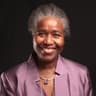 Dame Neslyn Watson-Druée, DBE