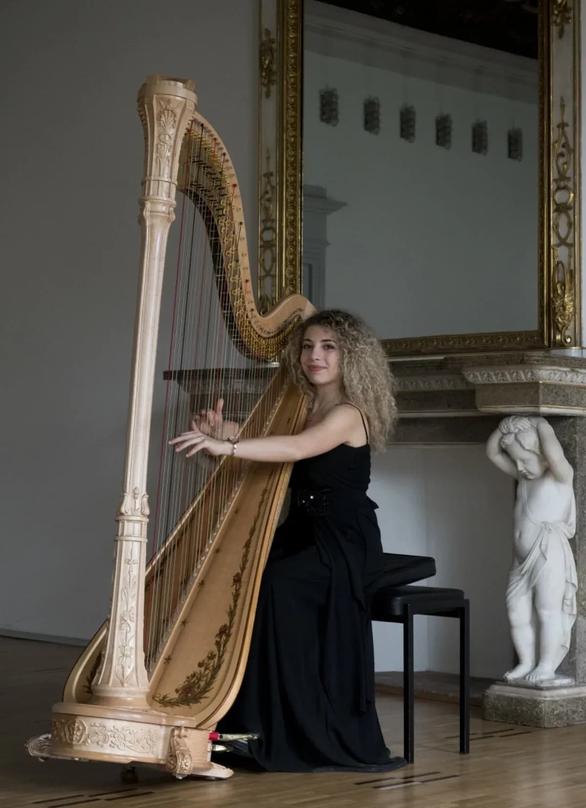 Swiss-Italian harpist Jasmine Gitti at the harp